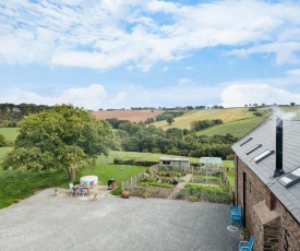 NEW Barn Conversion. Idyllic and unspoiled views complete with Hot Tub and Fire