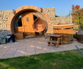 Winter escape luxury hobbit house with hot tub